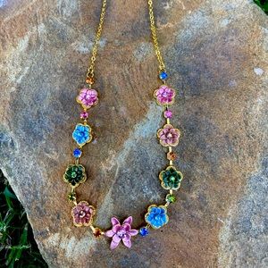 Two vintage costume jewelry necklaces.